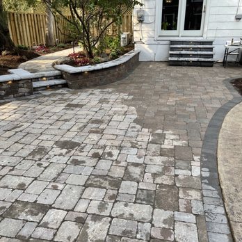 Margraves Landscaping - a brick patio with a retaining wall - Landscaping Near Me - Manchester, Michigan Margraves Landscaping - a brick patio with a retaining wall - Landscaping Near Me - Manchester, Michigan