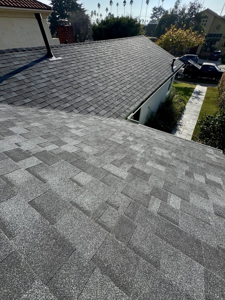 Slide of Economy Roofing