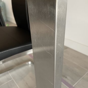 Executive Moving Systems - More scratches on stainless steel dining table base - Movers Near Me - Anaheim, California Executive Moving Systems - More scratches on stainless steel dining table base - Movers Near Me - Anaheim, California
