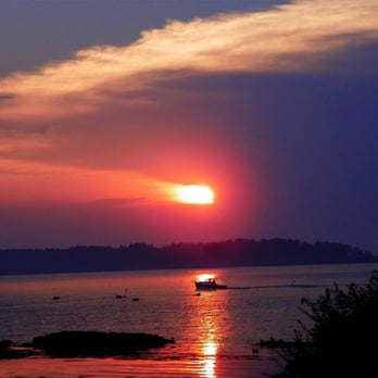 Harpswell Property Management - A lobster boat heading in at dusk. - Real Estate Services Near Me - Bailey Island, Maine Harpswell Property Management - A lobster boat heading in at dusk. - Real Estate Services Near Me - Bailey Island, Maine