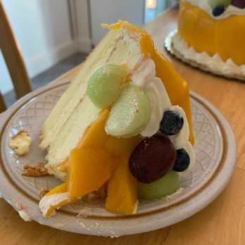 May's Cake House - Slide of Mango Mousse Cake with fruit - Bakeries Near Me - Boston, Massachusetts