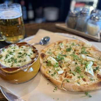 Wood Paddle Pizza and Tap - Chicken pot pie pizza with French onion soup and beer. - Pizza Near Me - Aurora, Colorado Wood Paddle Pizza and Tap - Chicken pot pie pizza with French onion soup and beer. - Pizza Near Me - Aurora, Colorado