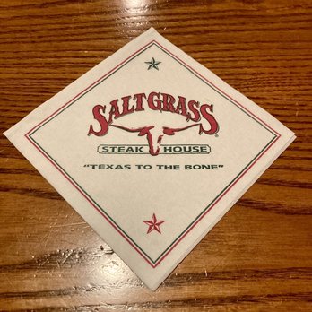 Saltgrass Steak House - Saltgrass Steakhouse Napkin in red don't and a longhorn as their logo. - Steakhouses Near Me - San Antonio, Texas Saltgrass Steak House - Saltgrass Steakhouse Napkin in red don't and a longhorn as their logo. - Steakhouses Near Me - San Antonio, Texas