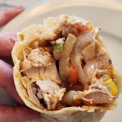 Jorge’s Mexicatessen - The Chicken Fajita Burrito is enormous, and loaded with big chucks of chicken, onions, bell peppers and tomatoes.