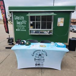 Crooked Letter BBQ - CLBBQ trailer set-up at an event.
