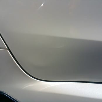 MB Collision - Before: Bulged out dent below the paint crack - Body Shops Near Me - Rancho Cucamonga, California MB Collision - Before: Bulged out dent below the paint crack - Body Shops Near Me - Rancho Cucamonga, California