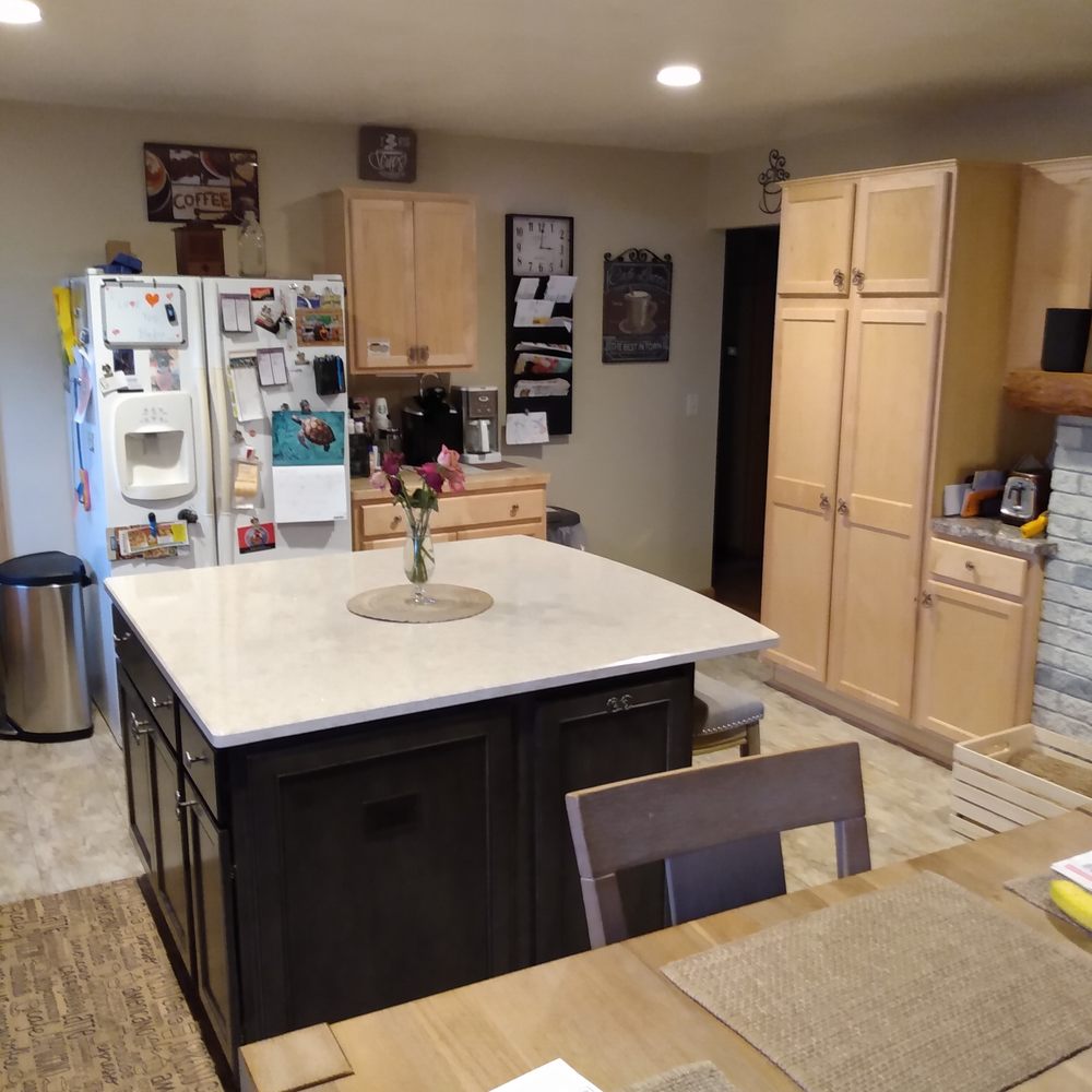 Excel Custom Contractors - a kitchen with a center island - General Contractors Near Me - Franklin, Wisconsin