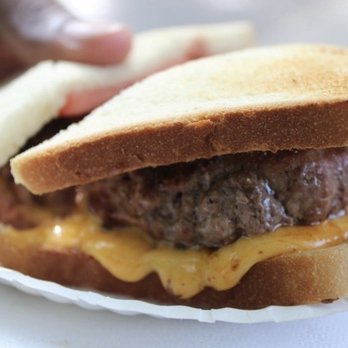 Louis' Lunch - That burger with tomato and whiz - Burgers Near Me - New Haven, Connecticut