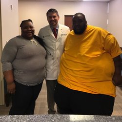 Dr. Procter with two of the cast members from "Family By the Ton". You can catch new episodes in January on The Learning Channel.