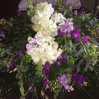 Armstrong Flowers - Casket spray (this is after family members removed flowers for keepsakes) !!! - Florists Near Me - Fort Wayne, Indiana