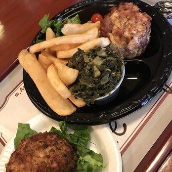 Faidley’s Seafood - Lump crab cake with greens and fries - Seafood Markets Near Me - Baltimore, Maryland