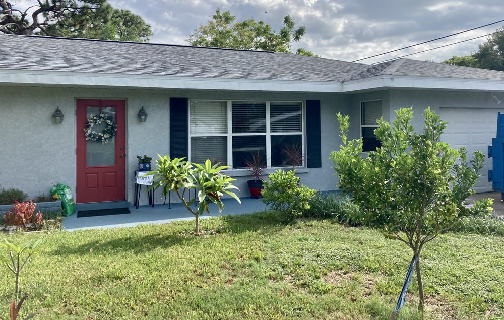 Slide of Red Dog's Roofing of Florida