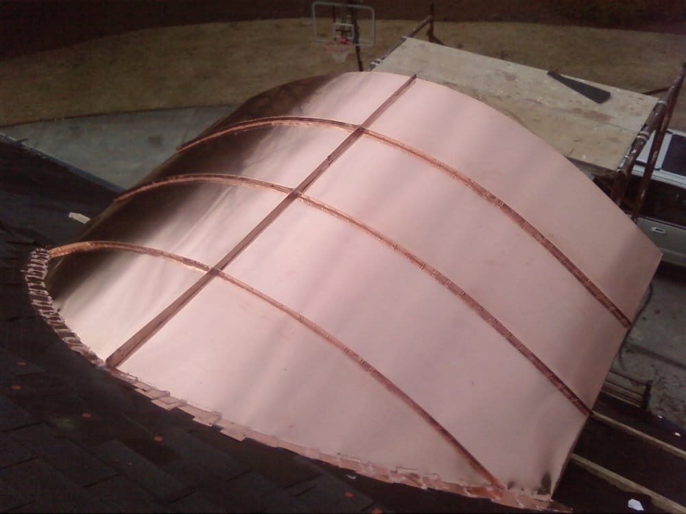 Slide of Total Roof Solutions