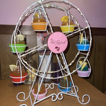 The Pink Squirrel - cocktail wheel- two 2oz margarita, planters punch, blue hawaiian, and brown derby - Cocktail Bars Near Me - Chicago, Illinois