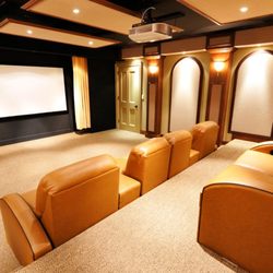 AmeriSat AV - Home Theater with Large Screen, Projector, and Surround Sound.