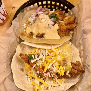 Torchy's Tacos - Baja shrimp taco (top) and trailer trash taco (bottom) - Tacos Near Me - Austin, Texas Torchy's Tacos - Baja shrimp taco (top) and trailer trash taco (bottom) - Tacos Near Me - Austin, Texas