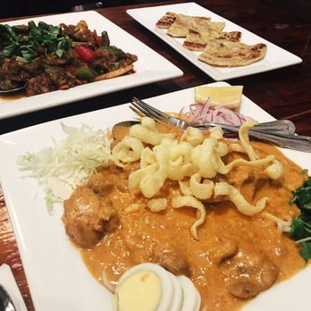 Dagon - Nan gyi wok (front), vegetable curry (back) , palata (side) - Burmese Near Me - Honolulu, Hawaii Dagon - Nan gyi wok (front), vegetable curry (back) , palata (side) - Burmese Near Me - Honolulu, Hawaii