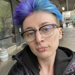 Fresh Lip piercing, "Orc" style (specially positioned lower vertical labrets)