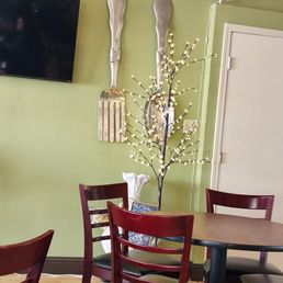 a table and chairs in a restaurant