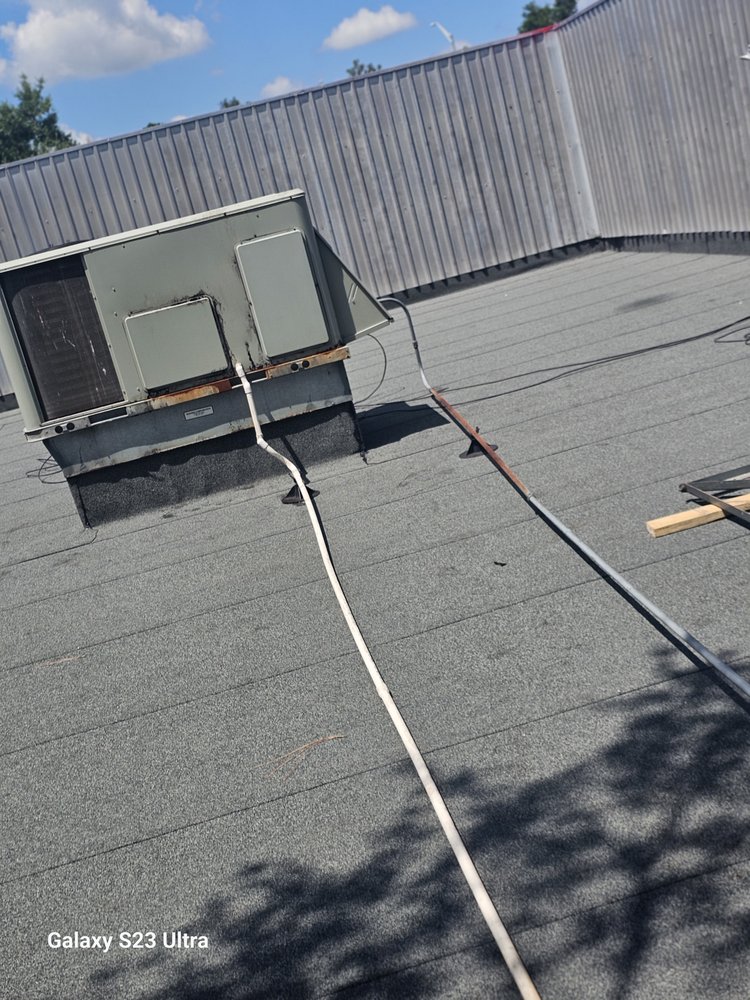 Slide of Osmin Roofing