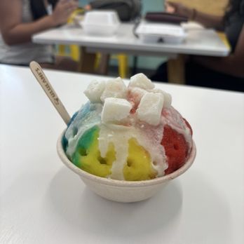 Ululani's Hawaiian Shave Ice - Hawaiian rainbow (strawberry, vanilla, pineapple) keiki size shave ice with snow cap (sweetened condensed milk) and mochi - Desserts Near Me - Plano, Texas Ululani's Hawaiian Shave Ice - Hawaiian rainbow (strawberry, vanilla, pineapple) keiki size shave ice with snow cap (sweetened condensed milk) and mochi - Desserts Near Me - Plano, Texas