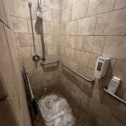 Anytime Fitness - Shower always floods and you have to shower with your feet under water.
