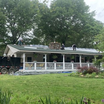 Perry Roofing - Crew working on the roof - Roofing Near Me - Fayetteville, Arkansas Perry Roofing - Crew working on the roof - Roofing Near Me - Fayetteville, Arkansas
