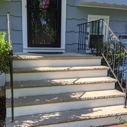 Old iron railing was rusted, had paint chipping everywhere and was detached in one spot. Old iron railing was rusted, had paint chipping everywhere and was detached in one spot.