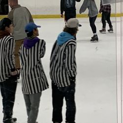 Rocket Ice Skating Rink - Skate guards not paying attention and playing on their phones