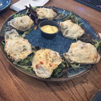 Snooky's Oceanfront - Oysters with crab n lobster stuffing. Hollandaise is the middle container - Seafood Near Me - North Myrtle Beach, South Carolina