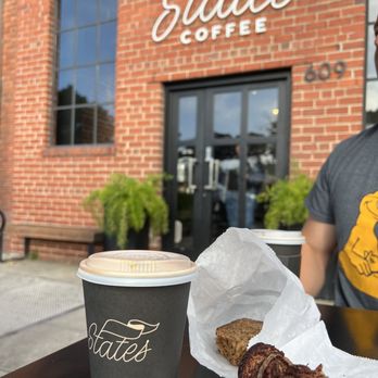 States Coffee - Photo of the front door/entrance from outdoor seating, to-go latte, and half eaten chocolate babka/banana bread :) - Coffee & Tea Near Me - Martinez, California States Coffee - Photo of the front door/entrance from outdoor seating, to-go latte, and half eaten chocolate babka/banana bread :) - Coffee & Tea Near Me - Martinez, California