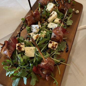 Allegro - Bacon wrapped dates...nice combo with Gorgonzola cheese & arugula - Italian Near Me - Upland, California Allegro - Bacon wrapped dates...nice combo with Gorgonzola cheese & arugula - Italian Near Me - Upland, California