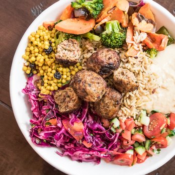 Roti - a bowl of food on a wooden table - Mediterranean Near Me - Washington, DC, District of Columbia Roti - a bowl of food on a wooden table - Mediterranean Near Me - Washington, DC, District of Columbia