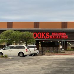 Half Price Books - Storefront (partially blocked by trees lol)