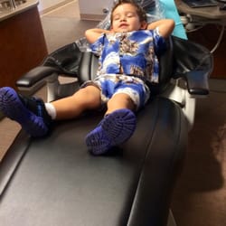 Dental Care of Mesa - Taking a ride to get used to visiting the dentist.