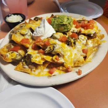Cafe Rosarita - Nacho Supreme not authentic if you're mexican u know how we load it up meat beans salsa avacate nacho cheese all casero made - Mexican Near Me - Oceanside, California