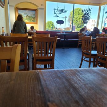Mariscos Puerto Nuevo - people sitting at tables in a restaurant - Mexican Near Me - Seaside, California Mariscos Puerto Nuevo - people sitting at tables in a restaurant - Mexican Near Me - Seaside, California