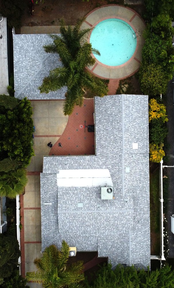 Slide of Mega Roofing