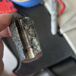 Everest auto sales and service - Broken casting that was floating around in the top of the head that they tried to glue back on.