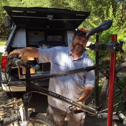 Mobile bike mechanic Justin Zaiser working his magic on my mountain bike.