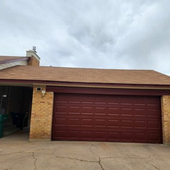 Painter ECol - They repainted this garage door and the trim around it to match - Painters Near Me