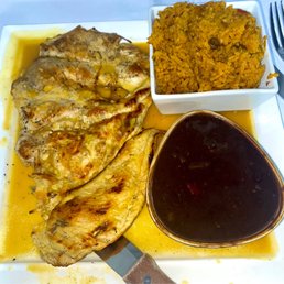 Chicken pechuga ,garlic sauce, black beans and yellow rice with beans Chicken pechuga ,garlic sauce, black beans and yellow rice with beans