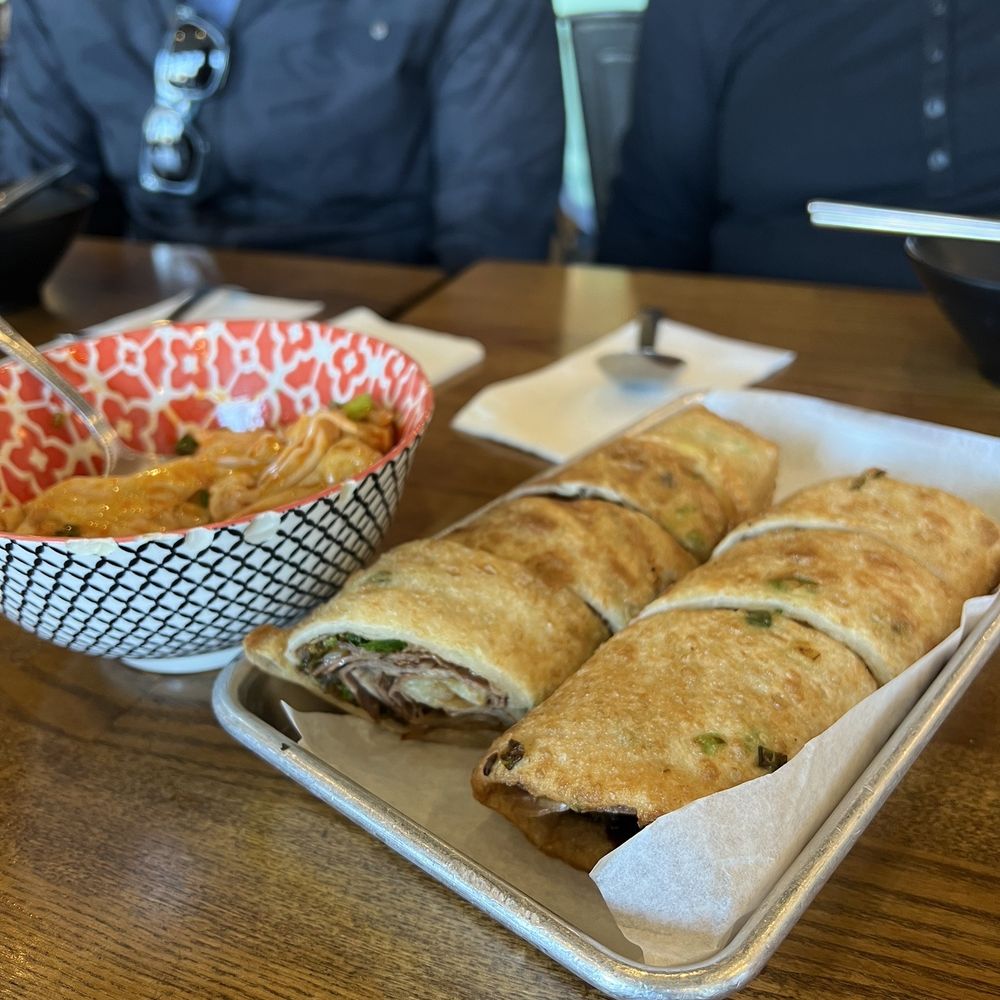 Liang's Village - Beef Pancake Wrap () & Spicy Red Oil Mini Wonton () (15 pcs) - Taiwanese Near Me - Cupertino, California Liang's Village - Beef Pancake Wrap () & Spicy Red Oil Mini Wonton () (15 pcs) - Taiwanese Near Me - Cupertino, California