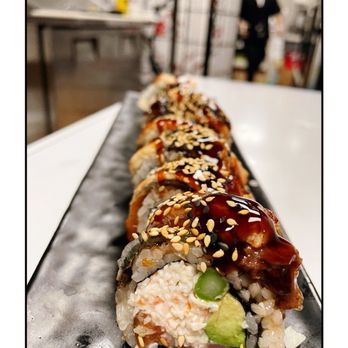 Hibiki Sushi & Grill - a closeup of a sushi roll - Japanese Near Me - Brandon, Mississippi Hibiki Sushi & Grill - a closeup of a sushi roll - Japanese Near Me - Brandon, Mississippi