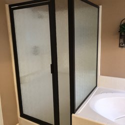 Murrieta Glass and Shower - Burnished bronze frame with rain glass