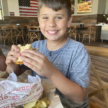 Sourdough & Co - a young boy eating a sandwich - Sandwiches Near Me - Windsor, California Sourdough & Co - a young boy eating a sandwich - Sandwiches Near Me - Windsor, California