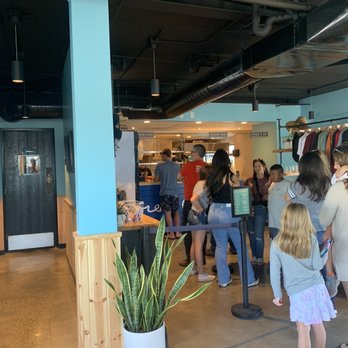 Green Cheek Beer Co. - Line at the downstairs counter - Breweries Near Me - Sunset Beach, California