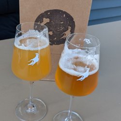 Supermoon Beer Company - Hello Maude farmhouse saison on the left, Sensitive King Belgian Tripel on the right
