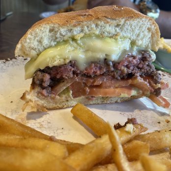 The Refuge - Side view of Brie cheeseburger - Burgers Near Me - San Mateo, California