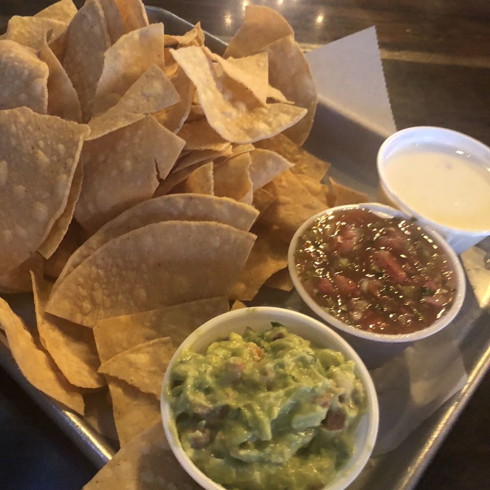 Appetizer chips with three sauces. The cheese sauce is deelish! Appetizer chips with three sauces. The cheese sauce is deelish!
